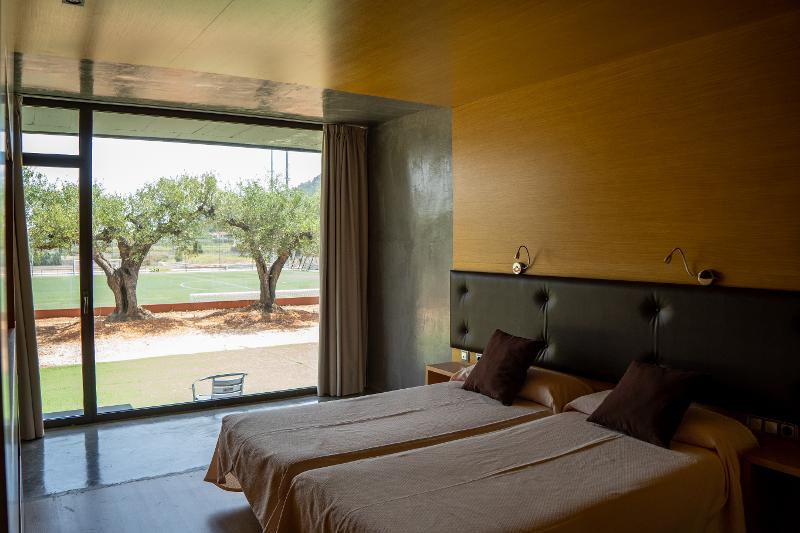Habitación doble en un campamento de futbol